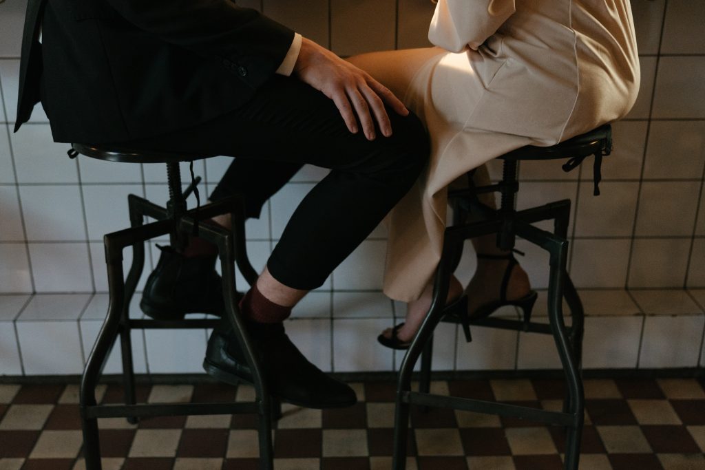 Flirting Techniques - men and women sitting affectionately